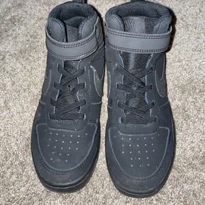 Boys black Nike high top sneakers